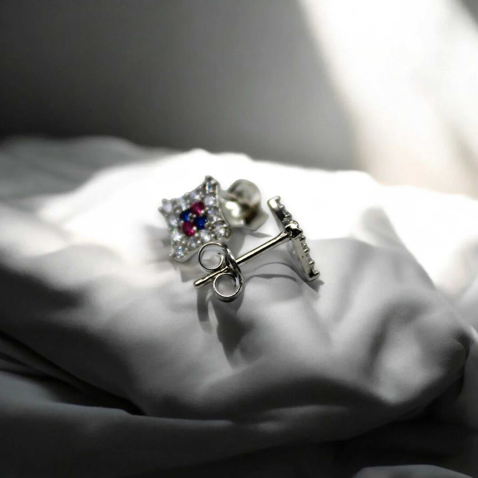 Pink And Blue Studded Diamond Stud Earrings | 925 Sterling Silver - SACH JEWELS